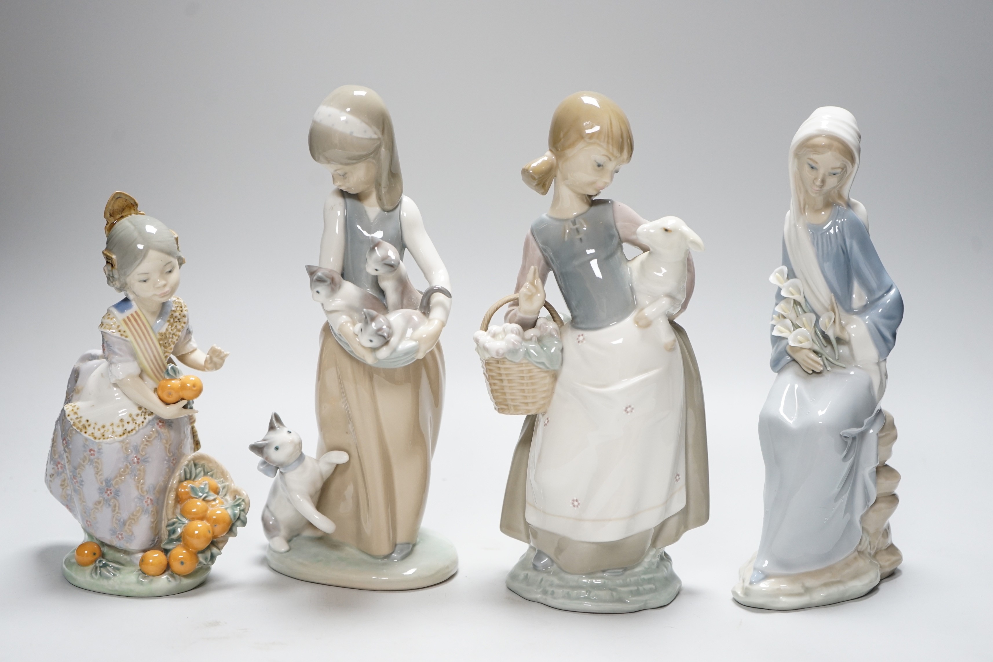 Four Lladro figures